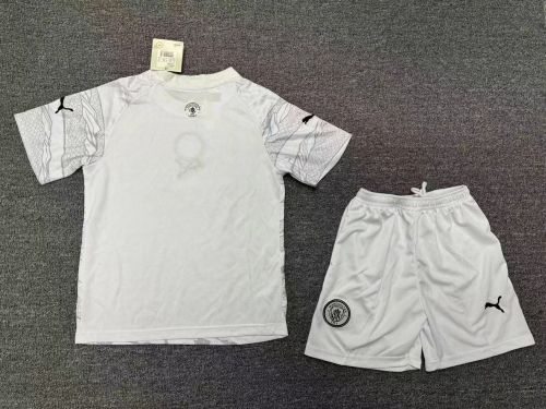 Manchester City Year Of The Dragon Kids Suit 23/24