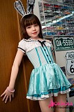 
緑ワンピースを着用した清楚系ラブドールの立ち姿
