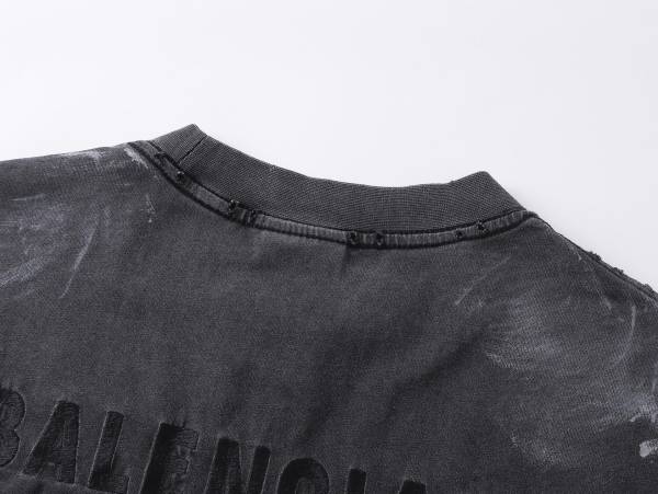Balanciag@ Graffiti distressed long-sleeve shirt. 2025