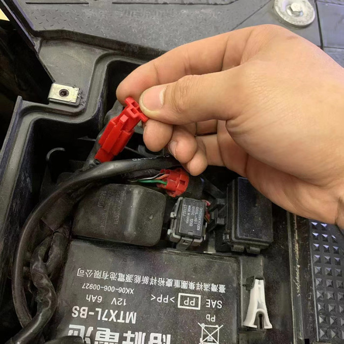 Clip for motorcycle to program